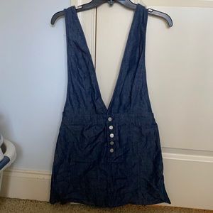boutique dress with long V cutouts on front & back